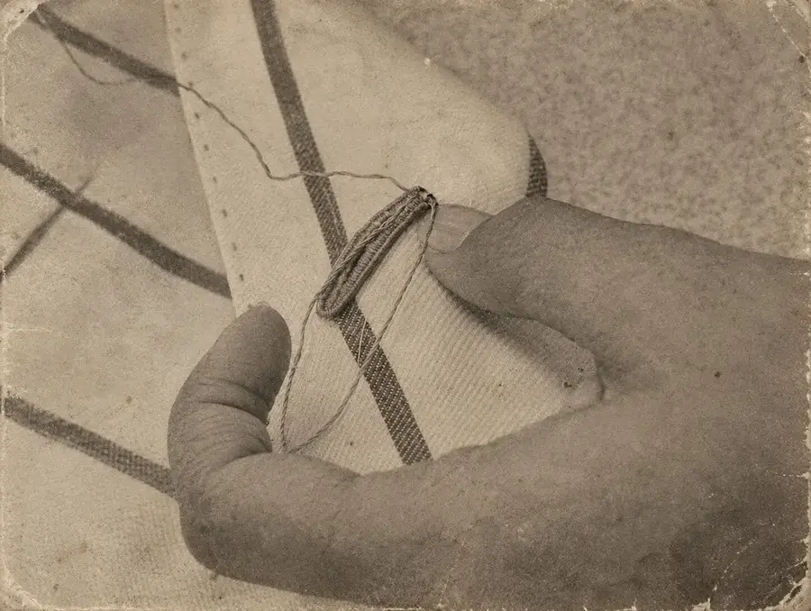 A hand-stitched suit buttonhole, a Laxmi Tailors tradition